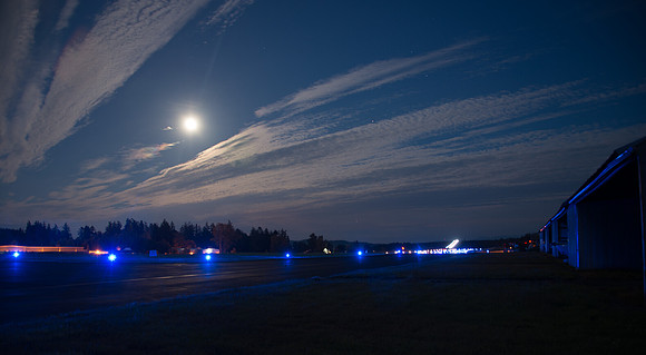 Airplane landing at night at the Friday Harbor Airport