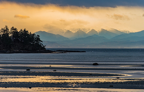 Storm Covered Olympic Mountains Over False Bay