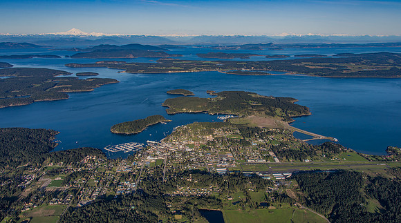 Looking across Friday Harbor and the San Juan Islands to the Cascades